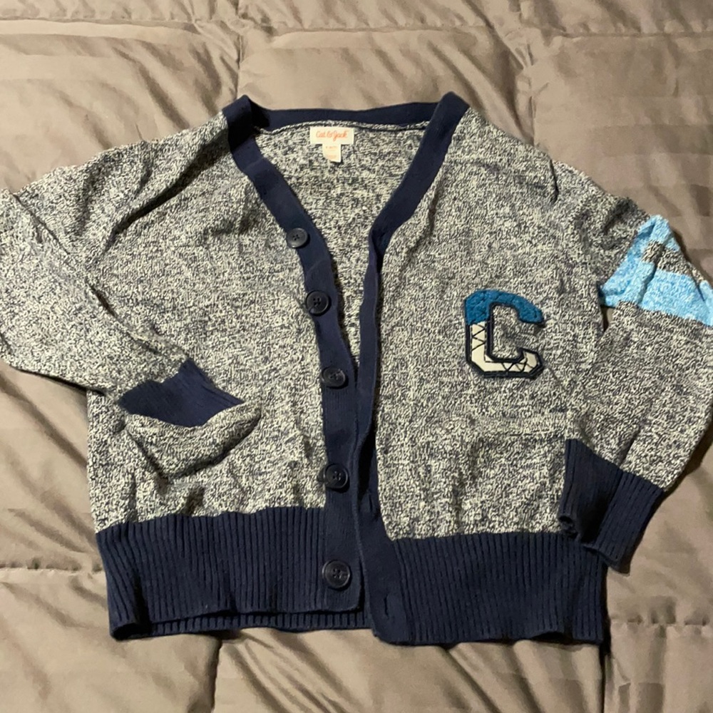 ‘C’ button down sweater